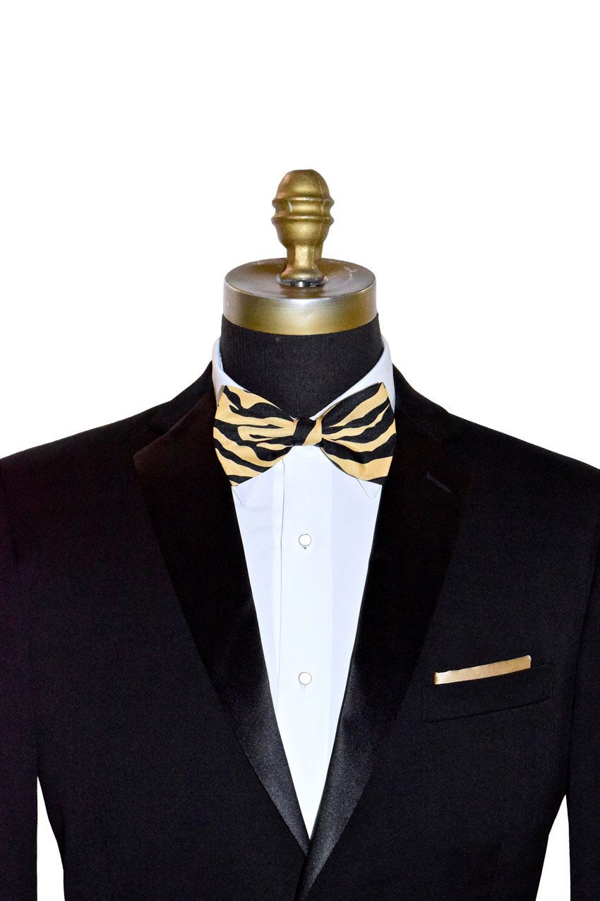 Black tuxedo with a brown and black zebra print bow tie on a mannequin against a white background
