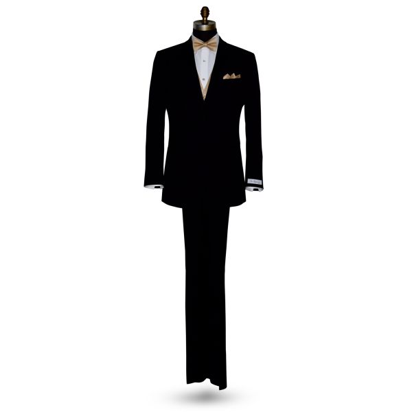 full life size mannequin wearing a black tuxedo with a white tuxedo shirt with a golden "pre-tied" bowtie and vest against a white background