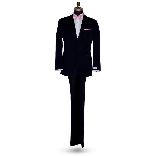 full length mannequin wearing a black tuxedo wearing a white tuxedo shirt with a pink silk "tie-yourself" bowtie against a white background