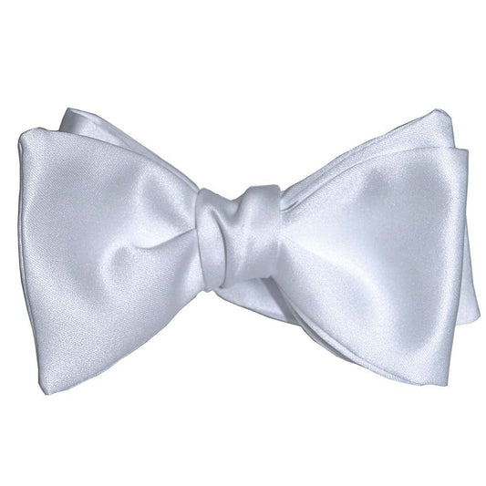 White "tie-yourself" bow tie on a white background
