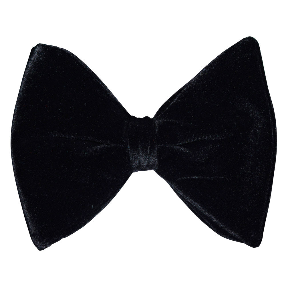 Big black velvet bow tie on a white background