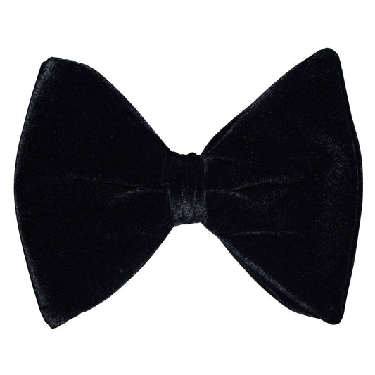 Big black velvet bow tie on a white background