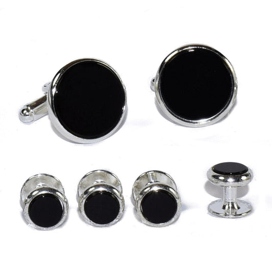 Set of black round onyx cufflinks and studs in a silver setting on a white background