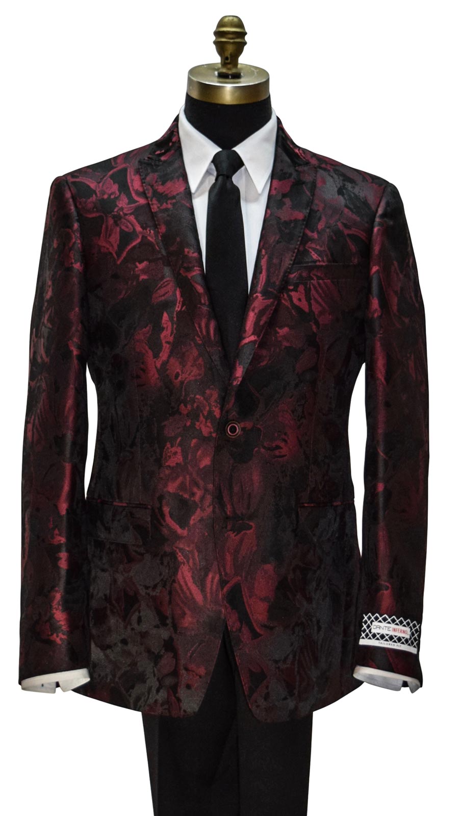 Red and black patterned dinner jacket with a "Dante Inferno" branded label on a mannequin with a white shirt and black satin skinny dress-tie