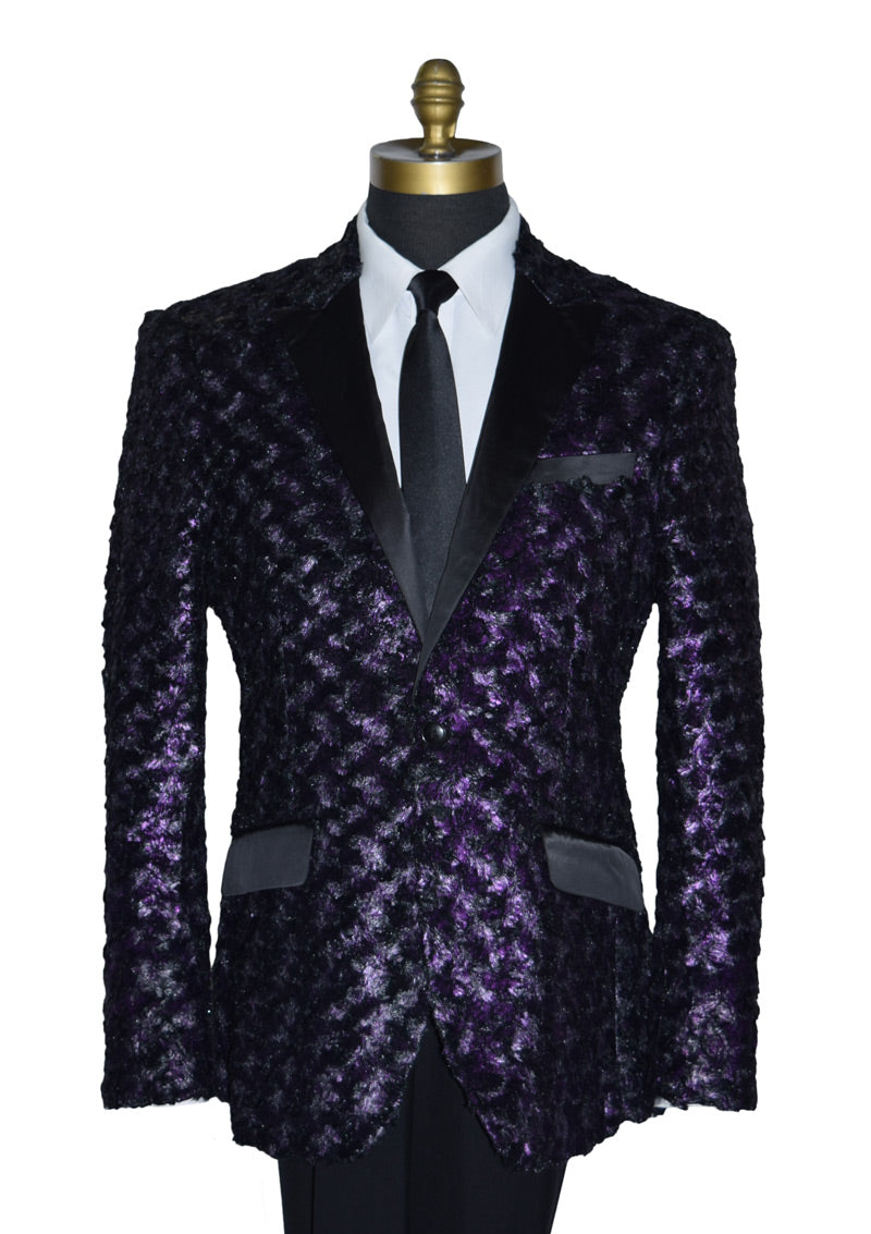 Purple patterned blazer on a mannequin with a white shirt and black skinny satin dress-tie.