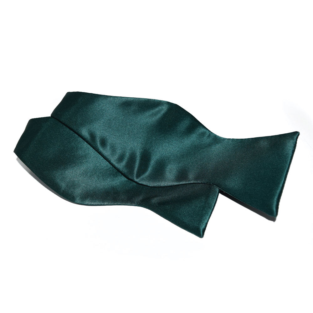 hunter green self-tie bowtie on a white background