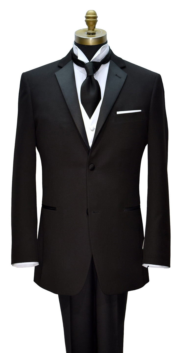 close-iup front view mannequin wearing a Black tuxedo with a white shirt and black dress-tie on a white background