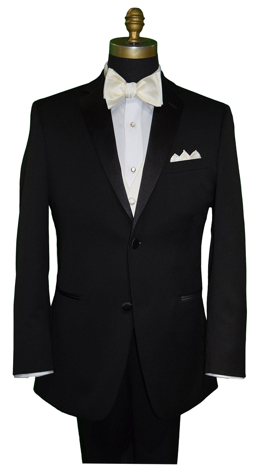 mannequin wearing a black tuxedo with ivory vest and bowtie and a white tuxedo shirt with pearl studs and cufflinks by San Miguel Especial