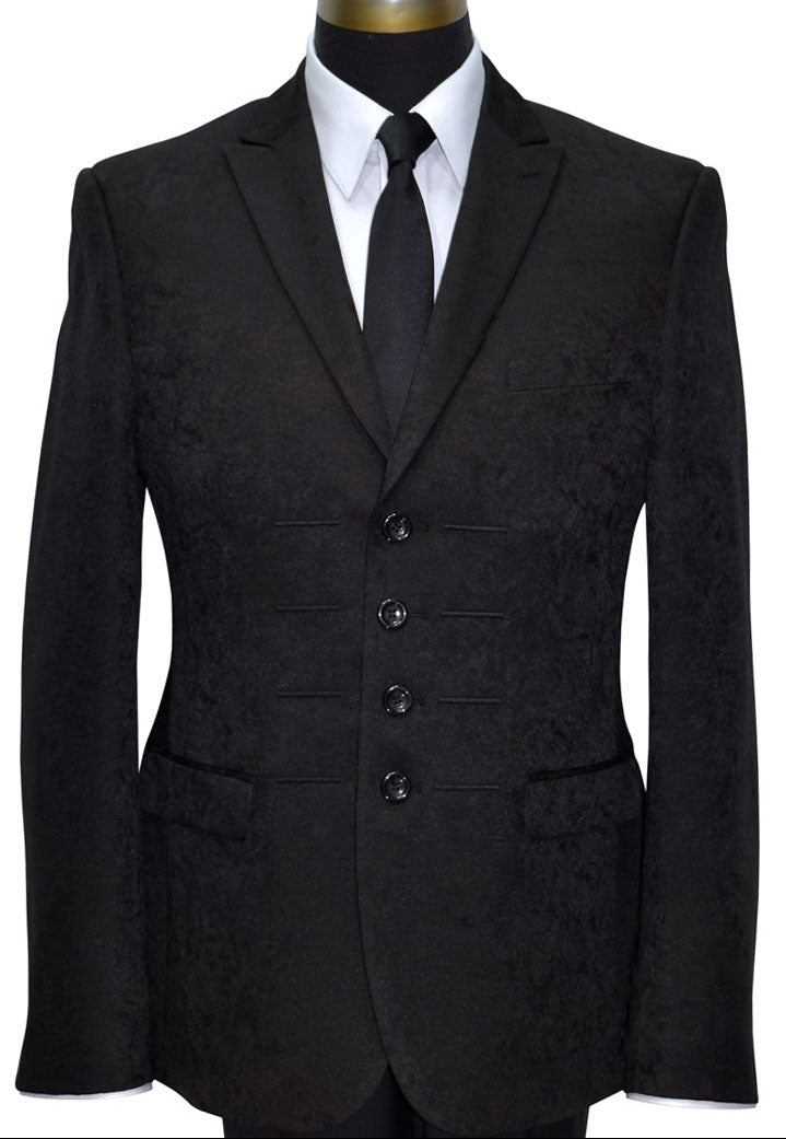 Black suit jacket on a mannequin with a white shirt and black satin stie.inny dress-tie