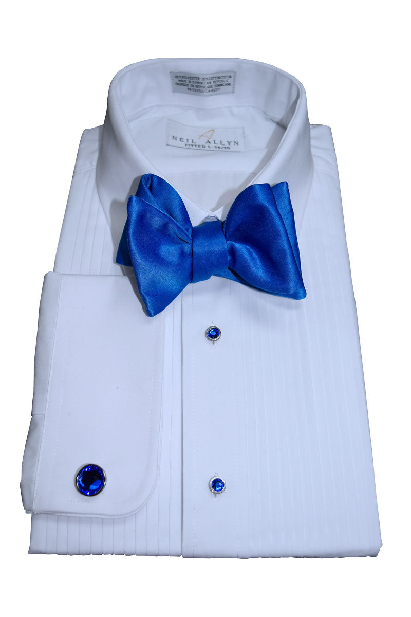 White tuxedo shirt with blue bow tie and sapphire blue studs and cufflink on a white background