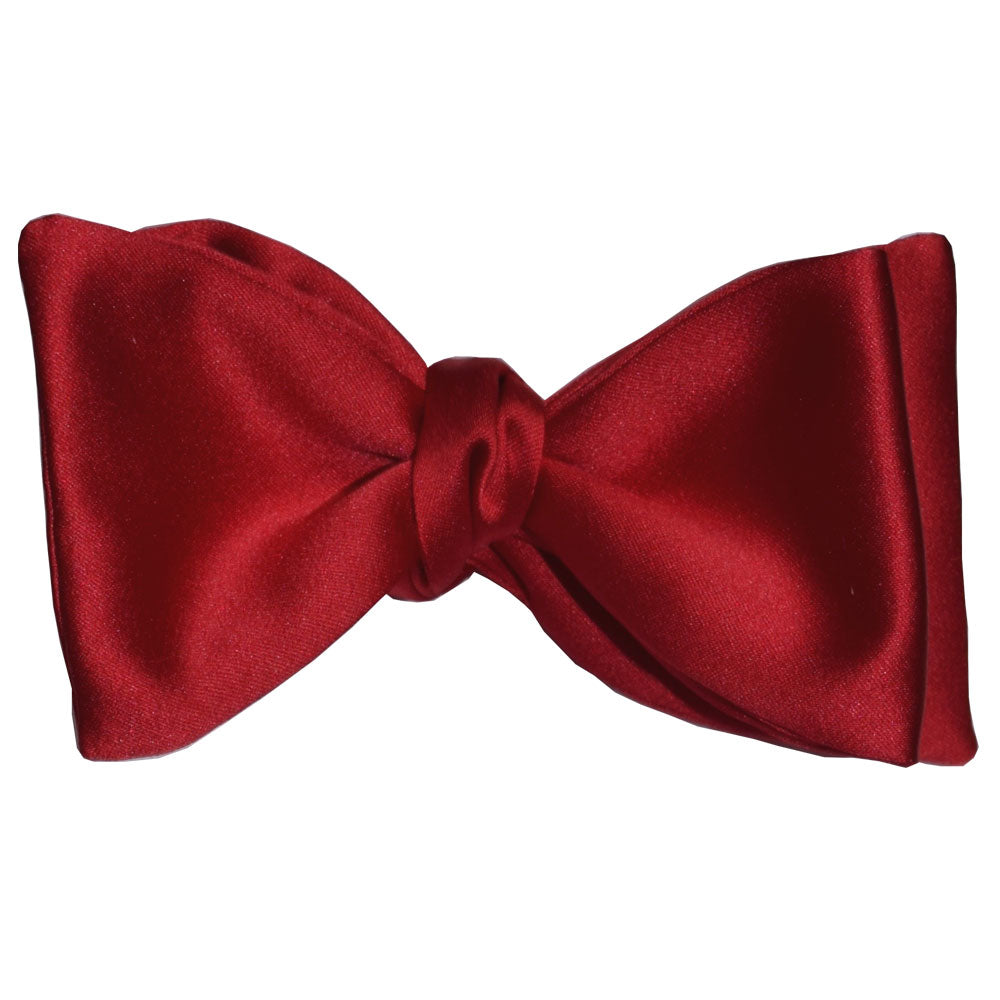 Red satin bow "tie-yourself" bowtie on a white background