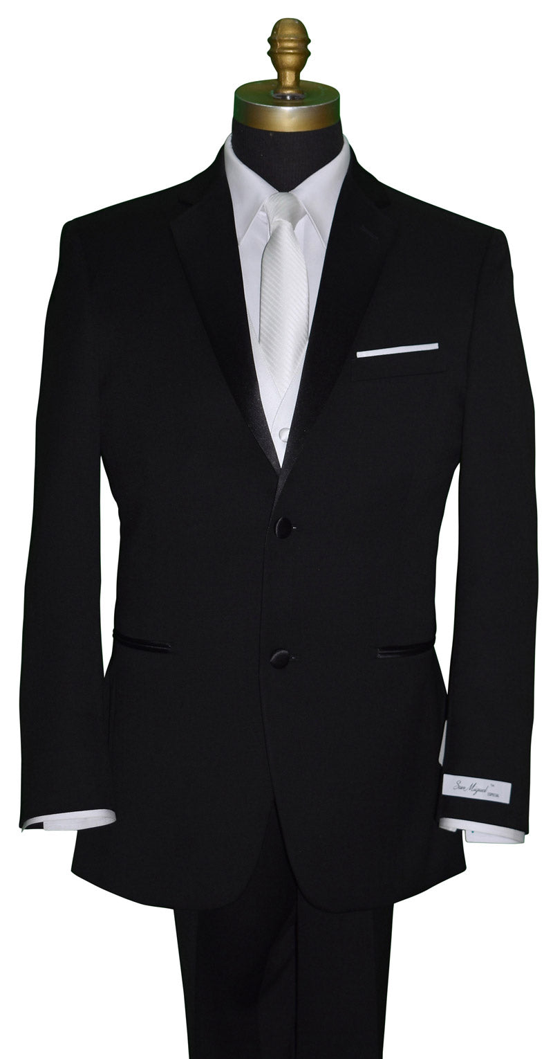 Black wedding suit with white shirt on a mannequin with a white necktie and a white four-button vest against a white background