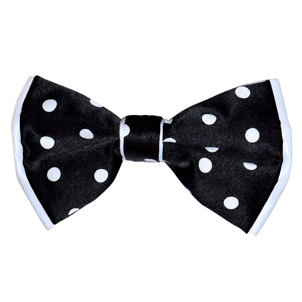 Black bow tie with white polka dots on a white background