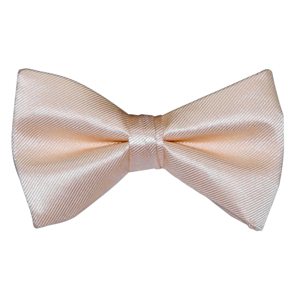 nude color "pre-tied" bow tie on a white background