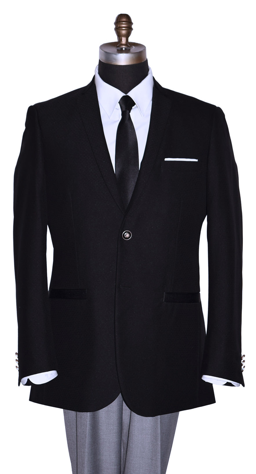 Black suit jacket with white shirt and a black satin skinny dress-tie on a mannequin against a white background