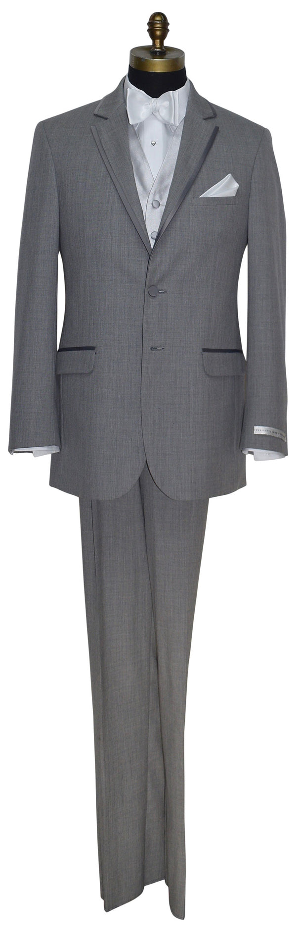 mannequin wearing a gray tuxedo with white vest and bowtie and pearl cufflinks and studs by San Miguel Formals against a white background