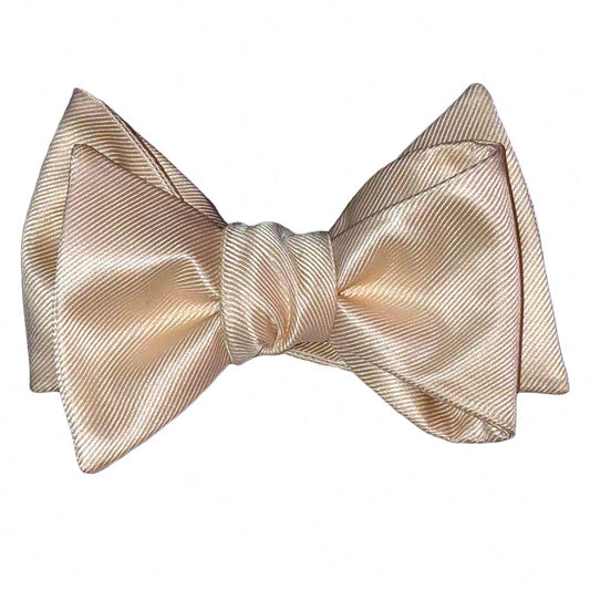 champagne "tie-yourself" bowtie against a white background