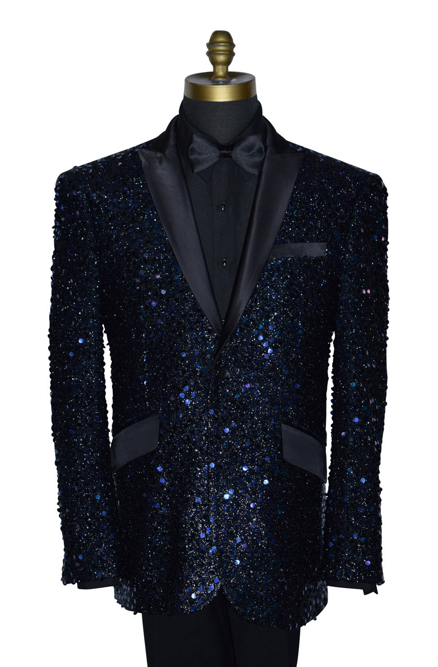 close-up Black and purple sequin tuxedo on a mannequin wearing a black shirt and black bowtie against a white background