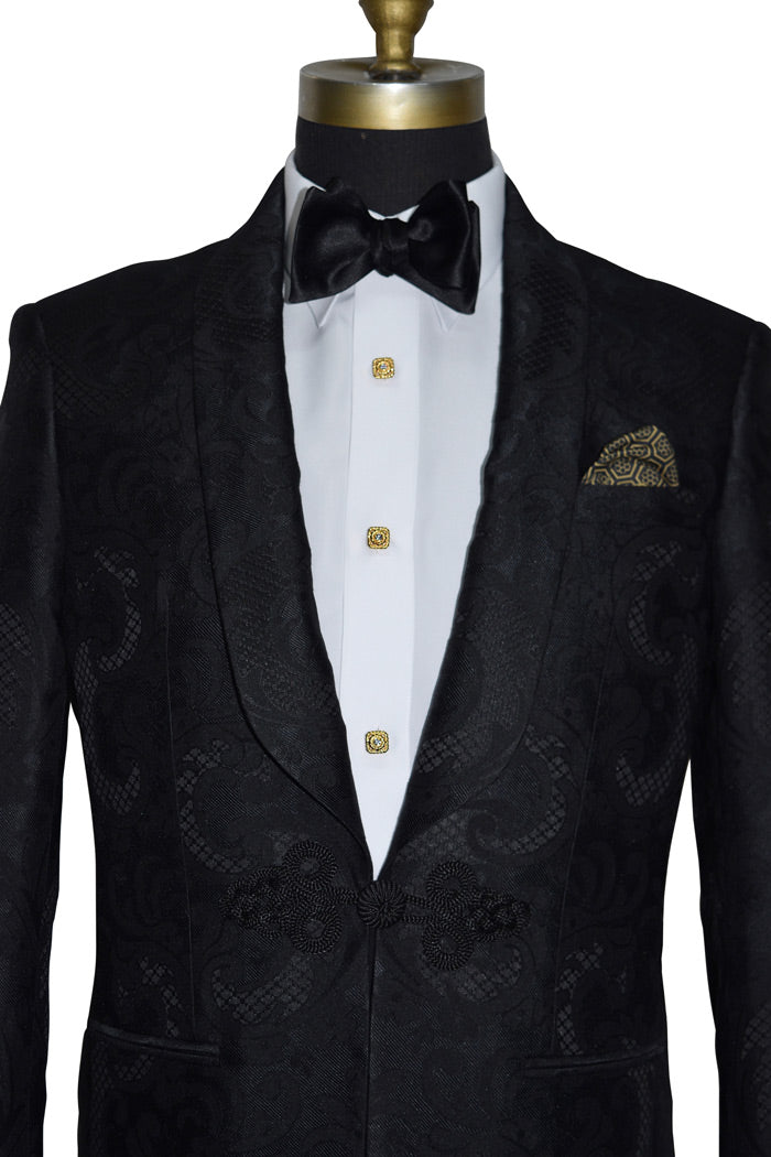 black dante inferno dinner jacket with brocade pattern on a mannequin with a white tuxedo shirt and black bowtie