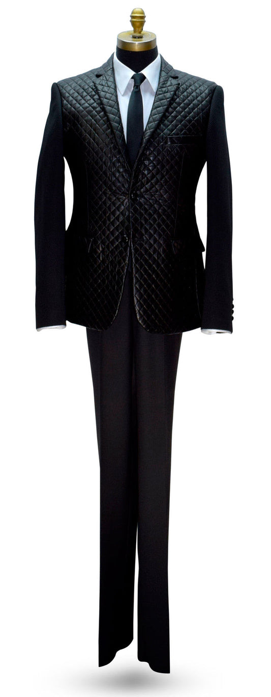 life size mannequin wearing a black tufted jacket with a white shirt and a long black skinny necktie against a white background