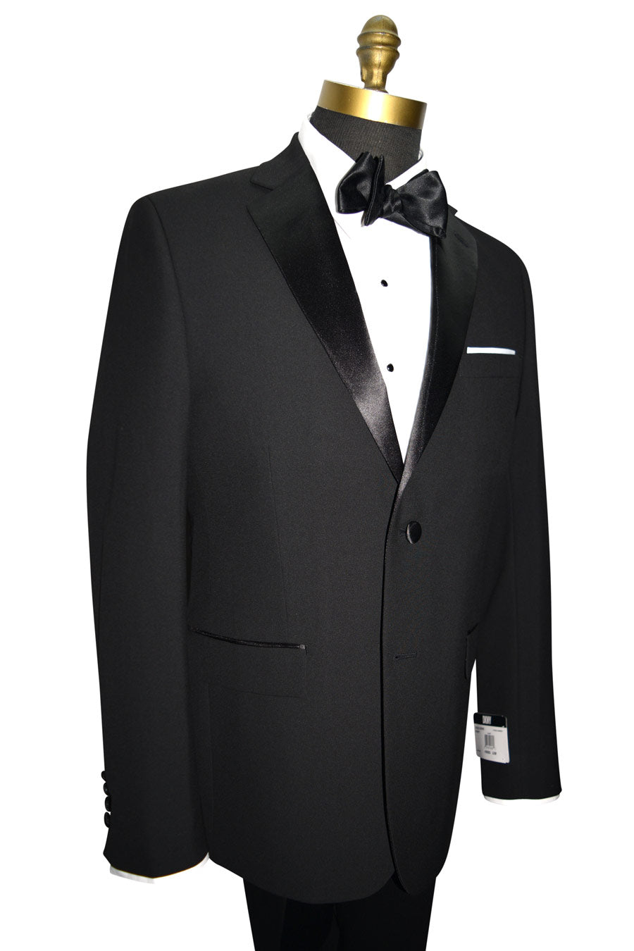 left side close up of black 2 button notch tuxedo with black satin bowtie against a white background