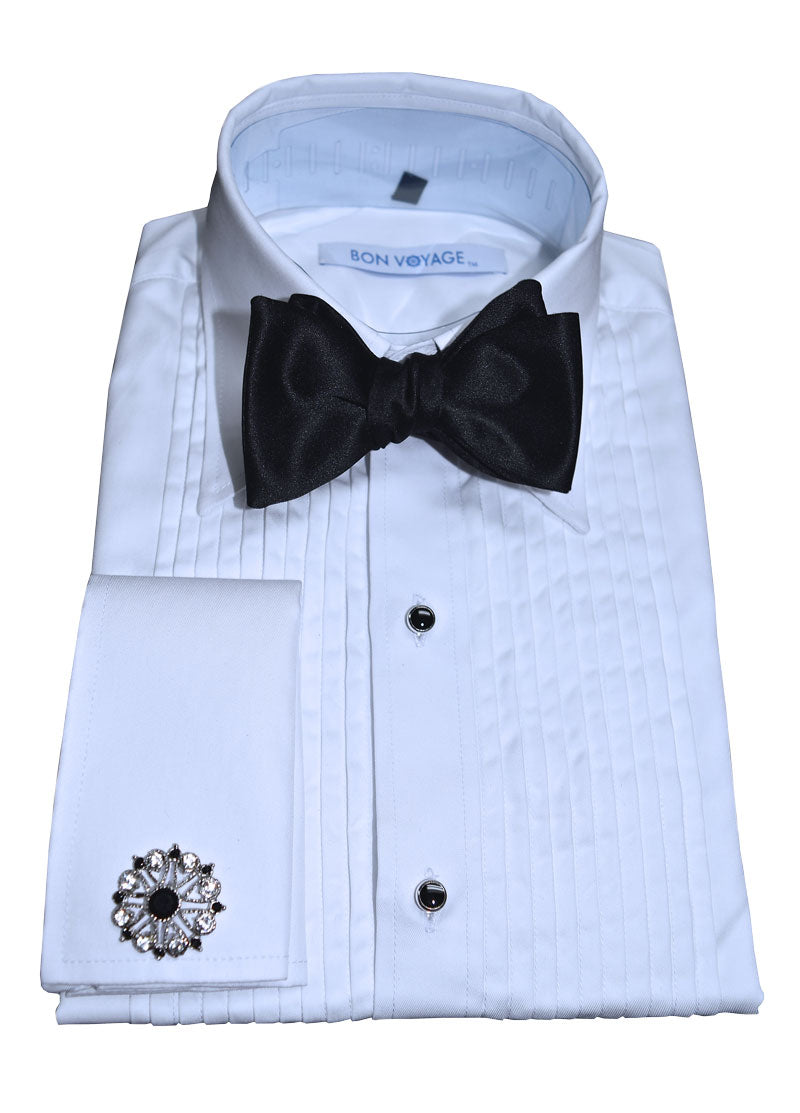 White tuxedo shirt with black "tie-yourself" bow tie and cufflinks on a white background