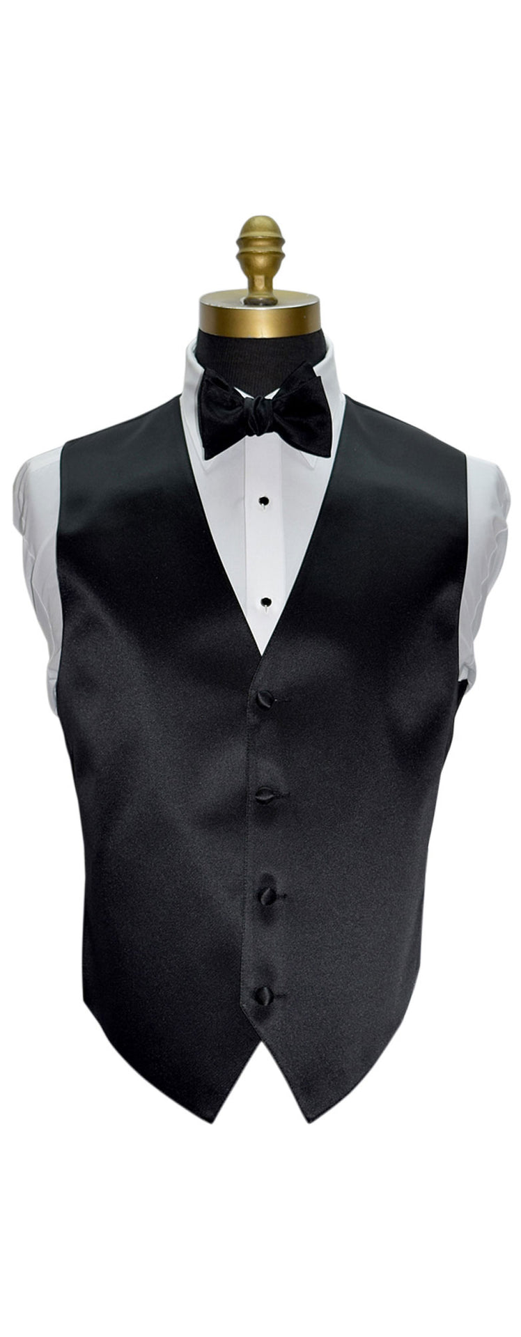 Black vest on a mannequin with a white shirt and black bow tie against a white background