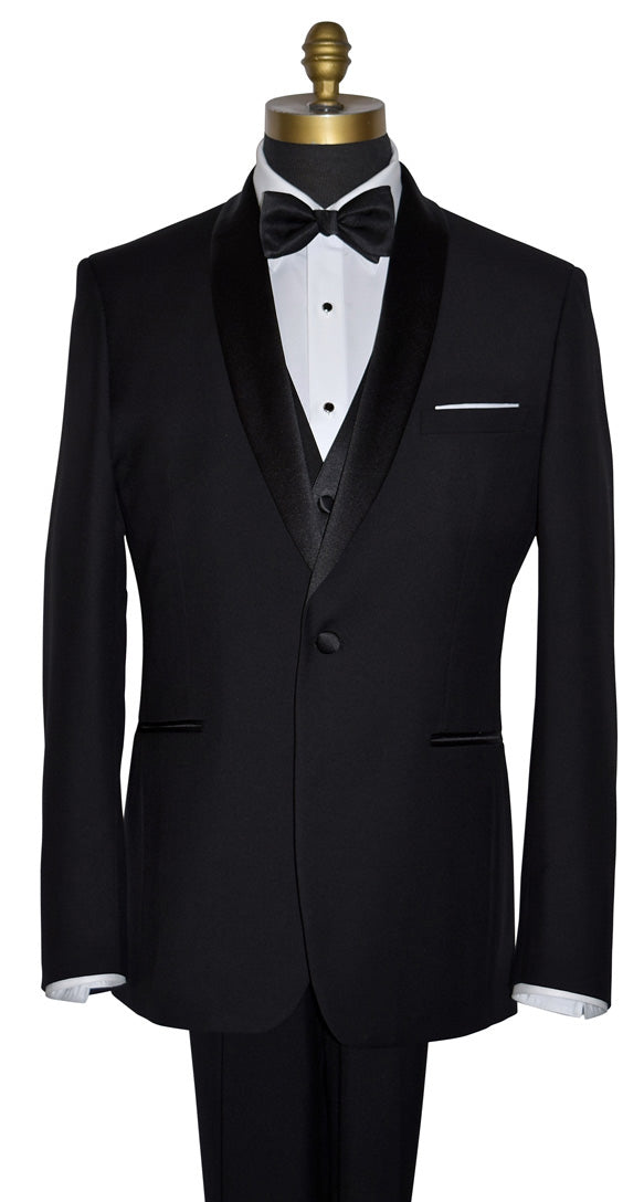 Black shawl collar tuxedo with white shirt and bow tie with a black four button vest on a mannequin against a white background