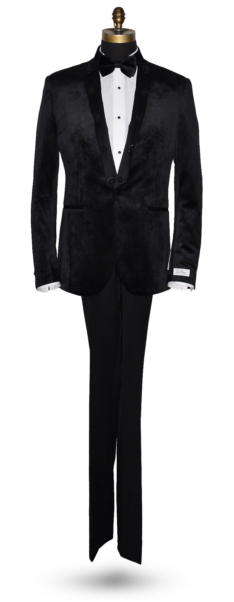 life size mannequin black velvet nehru tuxedo jacket worn with a black bowtie and black tuxedo pants against a white background
