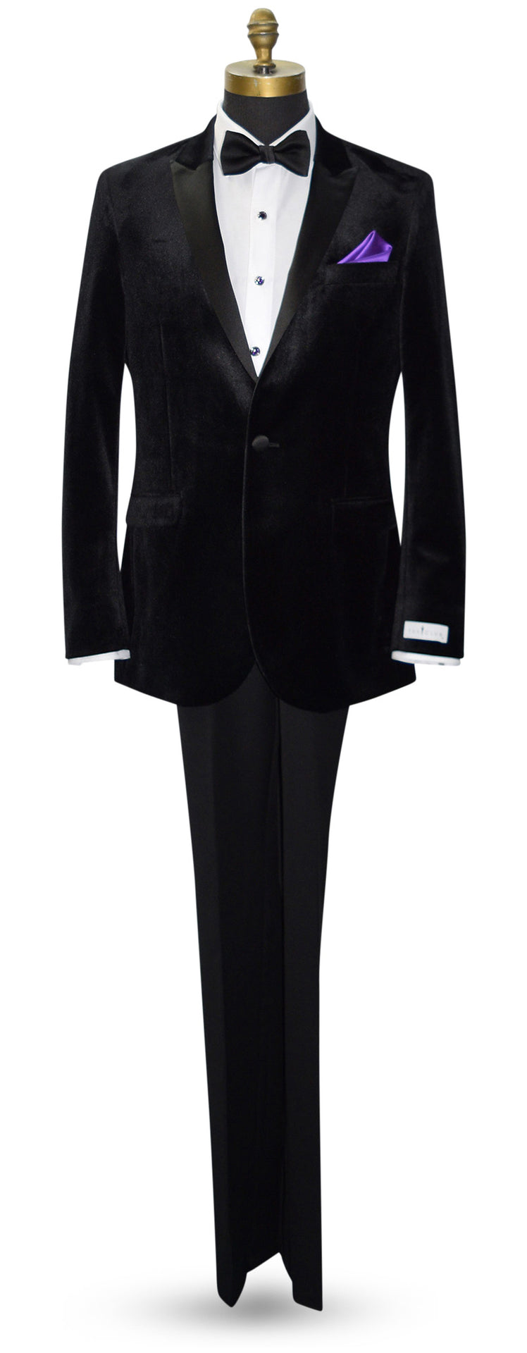 Full length mannequin wearing Black Velvet tuxedo with black bowtie and purple pocket handkerchief against a white background by tuxclub  