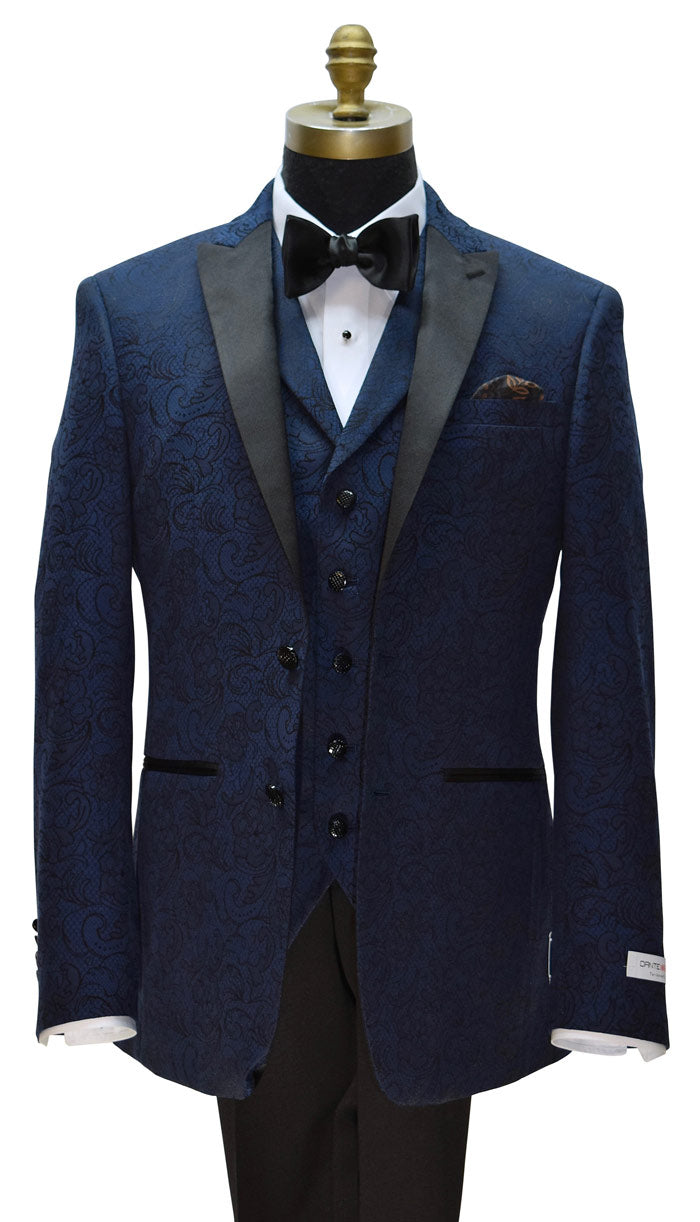 mannequin wearing a navy blue paisley tuxedo with matching navy blue paisley vest on a mannequin with a black satin bowtie against a white background