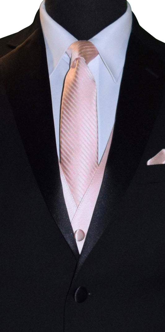 Black suit with a blush necktie and matching pocket square on a mannequin.
