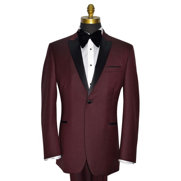 mannequin wearing a maroon tuxedo with a large velvet butterfly bowtie