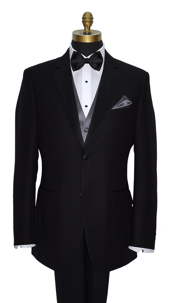 mannequin wearing a black notch-lapel tuxedo with a white dress shirt wearing a charcoal tuxedo vest and black pre-tied bowtie with a charcoal pocket handkerchief against a white background 