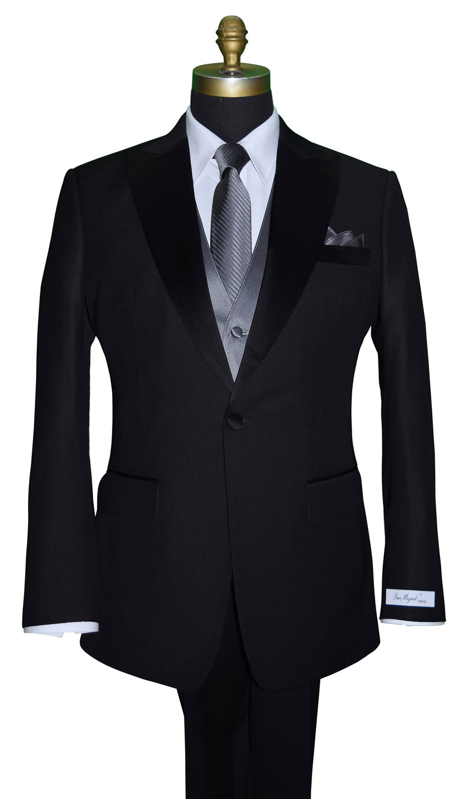 mannequin wearing a black peak lapel tuxedo with a white shirt and charcoal satin vest and charcoal subtle stripe necktie against a white background