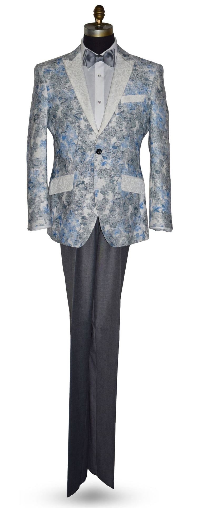 blue and gray floral pattern tuxedo jacket with white shirt and black pants on a mannequin against a white background