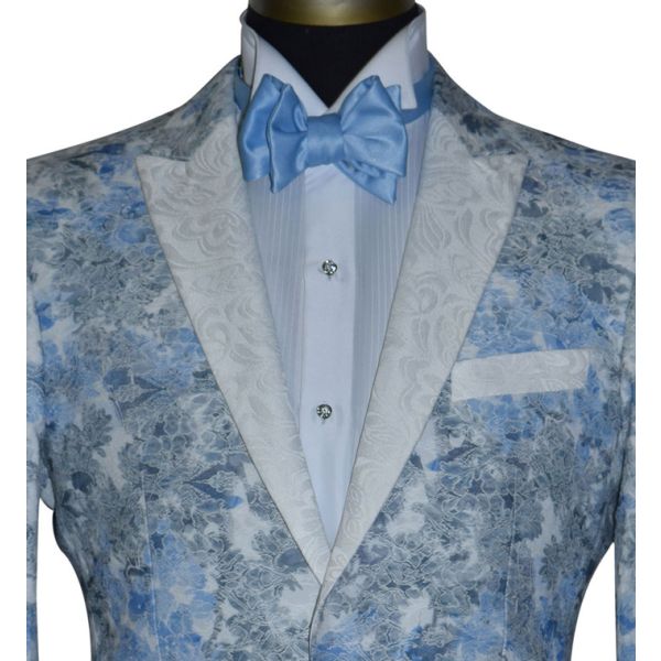 mannequin wearing a blue print tuxedo with cubic zirconia studs and cufflinks set in silver casings