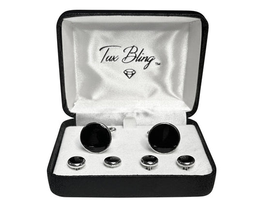 close up Black with silver setting cufflinks and studs set in a 'Tux Bling' box on a white background