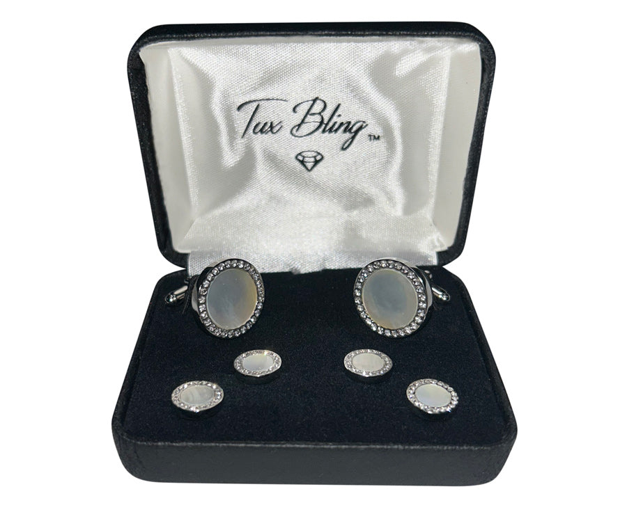 mother-of-pearl cufflinks and studs set in a silver setting with crystals in a 'Tux Bling' branded box.