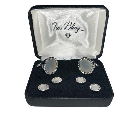 mother-of-pearl cufflinks and studs set in a silver setting with crystals in a 'Tux Bling' branded box.