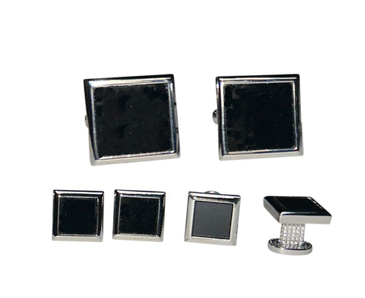 Set of black square cufflinks and studs with silver setting on a white background