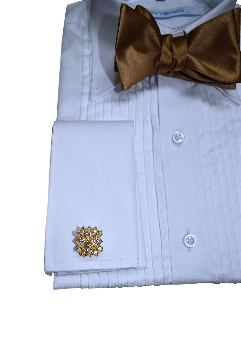 very close up white tuxedo shirt on display with a gold "tie-yourself" bowtie against a white background