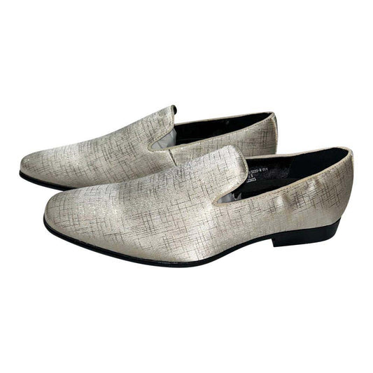 Pair of golden-tan slip-on loafers for men on a white background