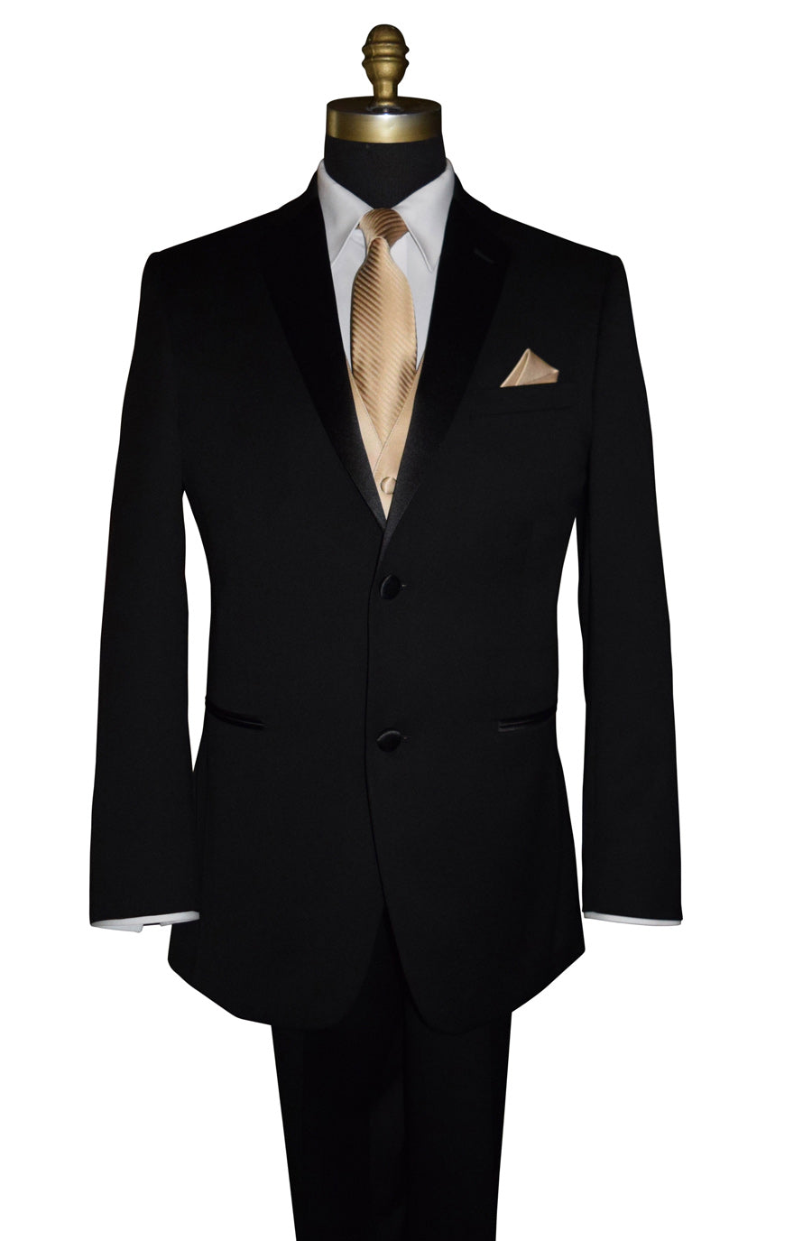 close-up mannequin wearing black tuxedo with a white shirt and golden stripe necktie and a golden tuxedo vest and pocket handkerchief against a white background
