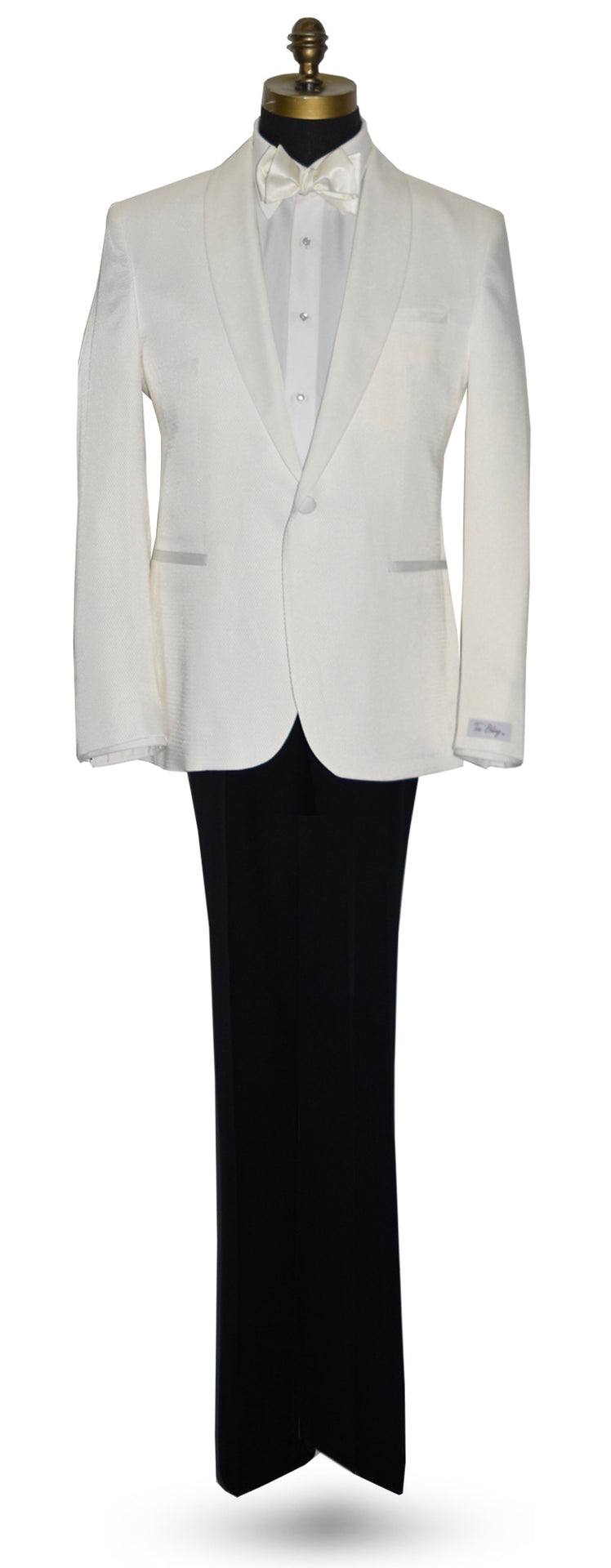 life size mannequin mannequin wearing an ivory shawl collar tuxedo with a white tuxedo shirt and a ivory tie-yourself bowtie against a white background