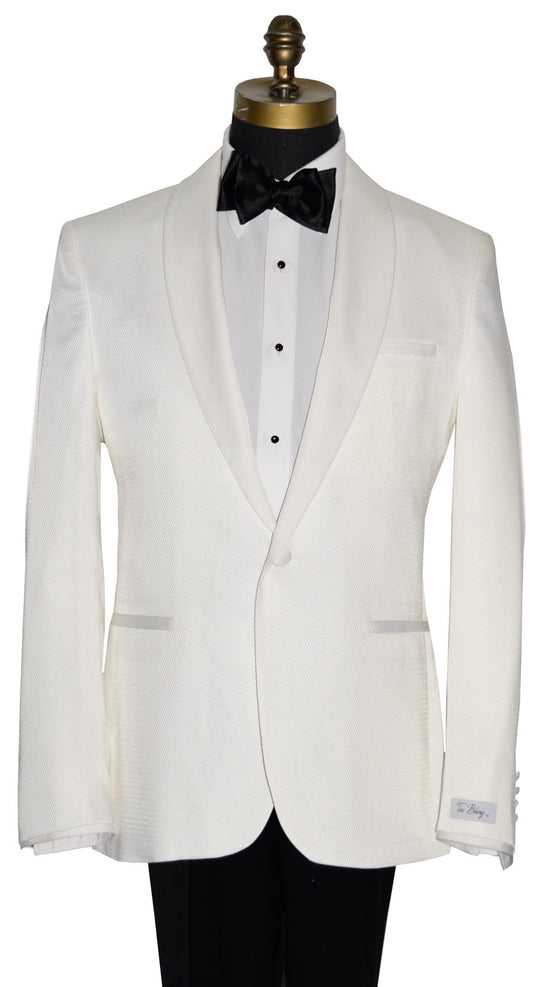 mannequin wearing an ivory shawl collar tuxedo with a white tuxedo shirt and a black  tie-yourself bowtie against a white background