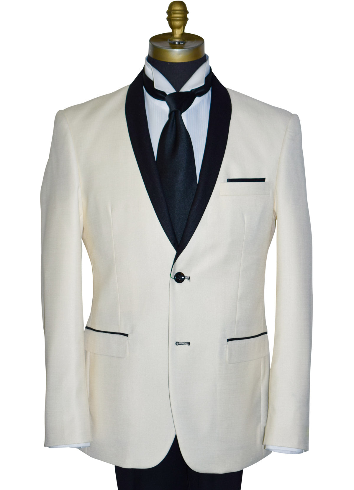 close-up ivory tuxedo with black shawl collar, a white tuxedo shirt and a black satin long necktie against a white background