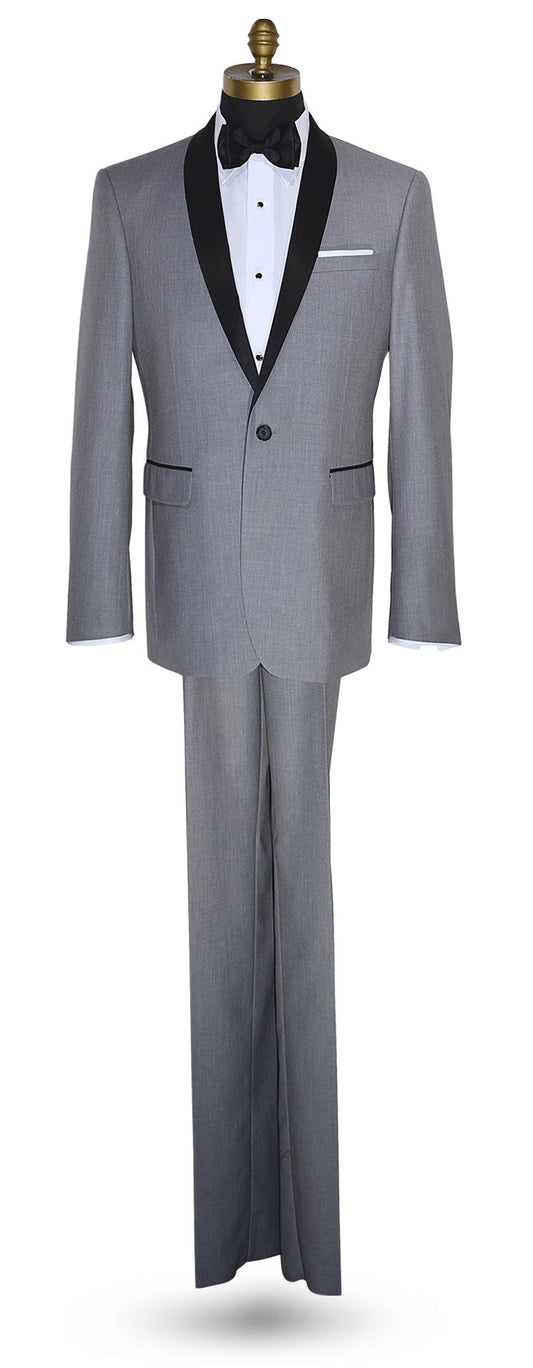 life size mannequin wearing alight-gray shawl collar tuxedo with black bow tie on a white background