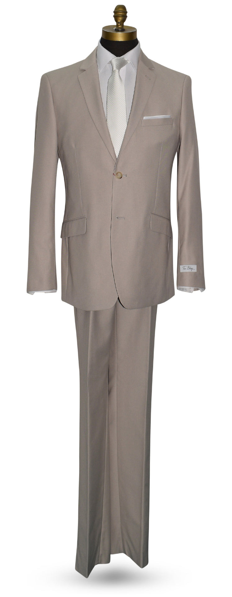 life size mannequin wearing beige mens suit with white long dress tie and "tux bling" branded label against a white background