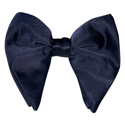 Navy blue satin butterfly bow tie on a white background